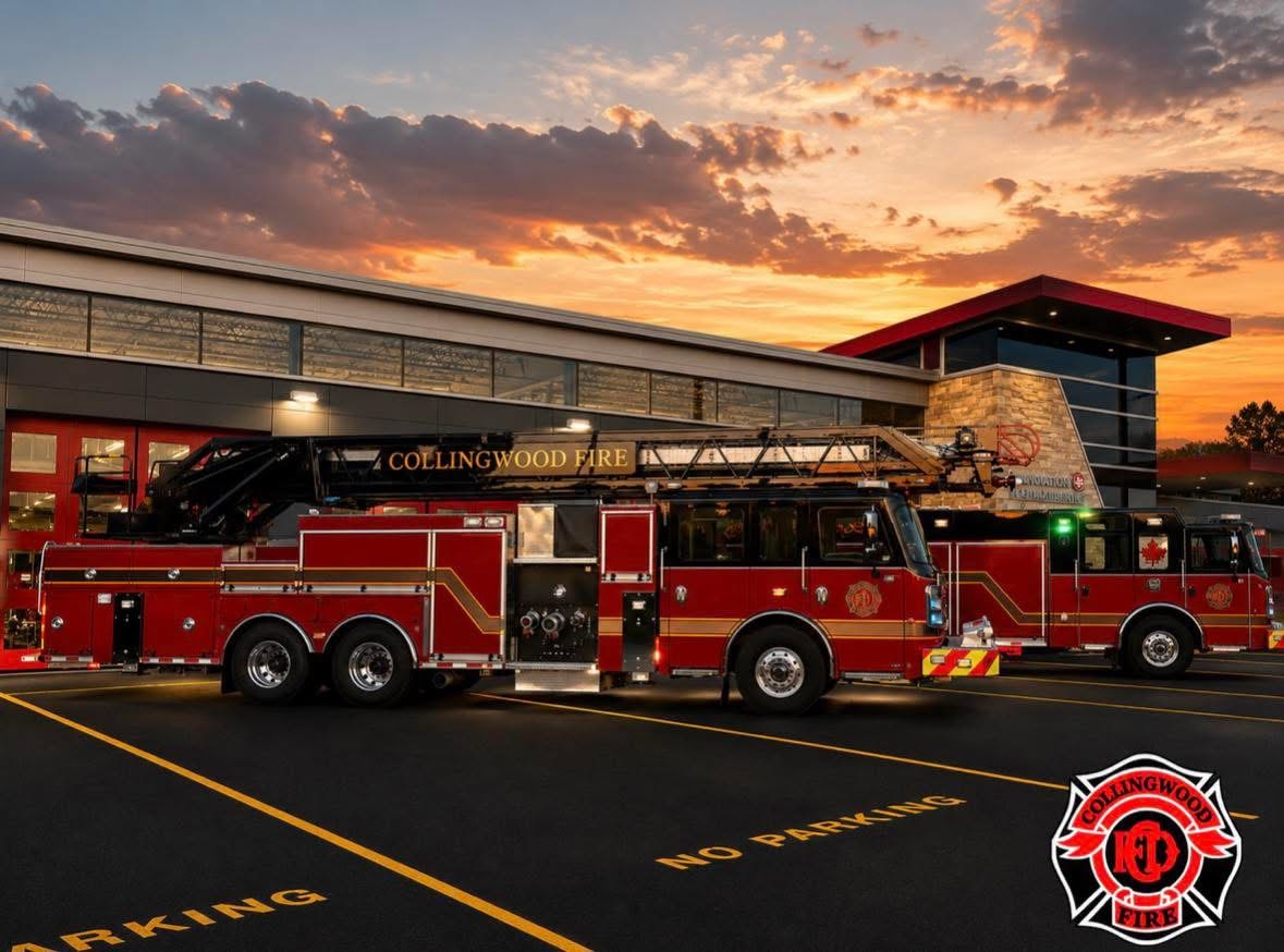 Collingwood Fire aerial ladder and pumper at sunset outside the fire station