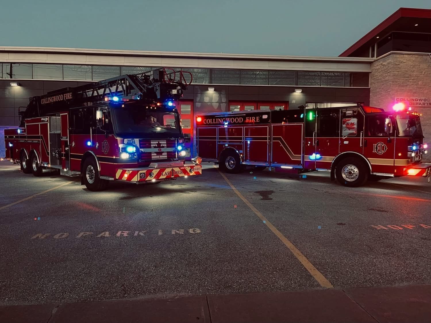 Collingwood Fire Ladder 1 and pumper with blue emergency lights at night