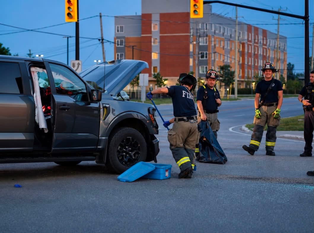 Collingwood Fire crew working a vehicle accident scene at dusk